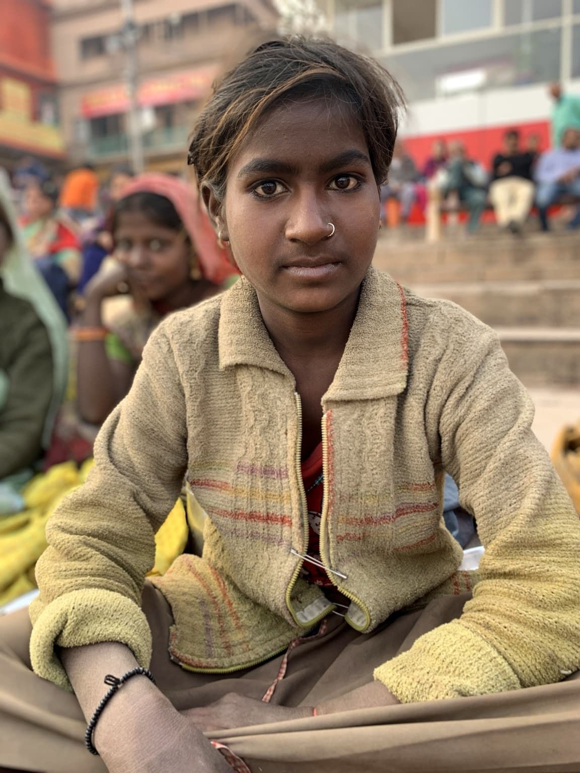 A quieter direct portrait records another brief encounter on the ghats of Varanasi, 2019.