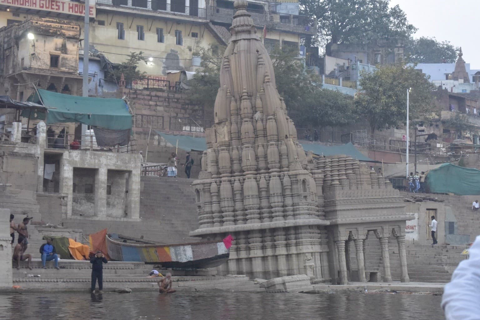 Ratneshwar Mahadev temple stands at the edge of the Ganges amid the riverfront ghats of Varanasi, 2019