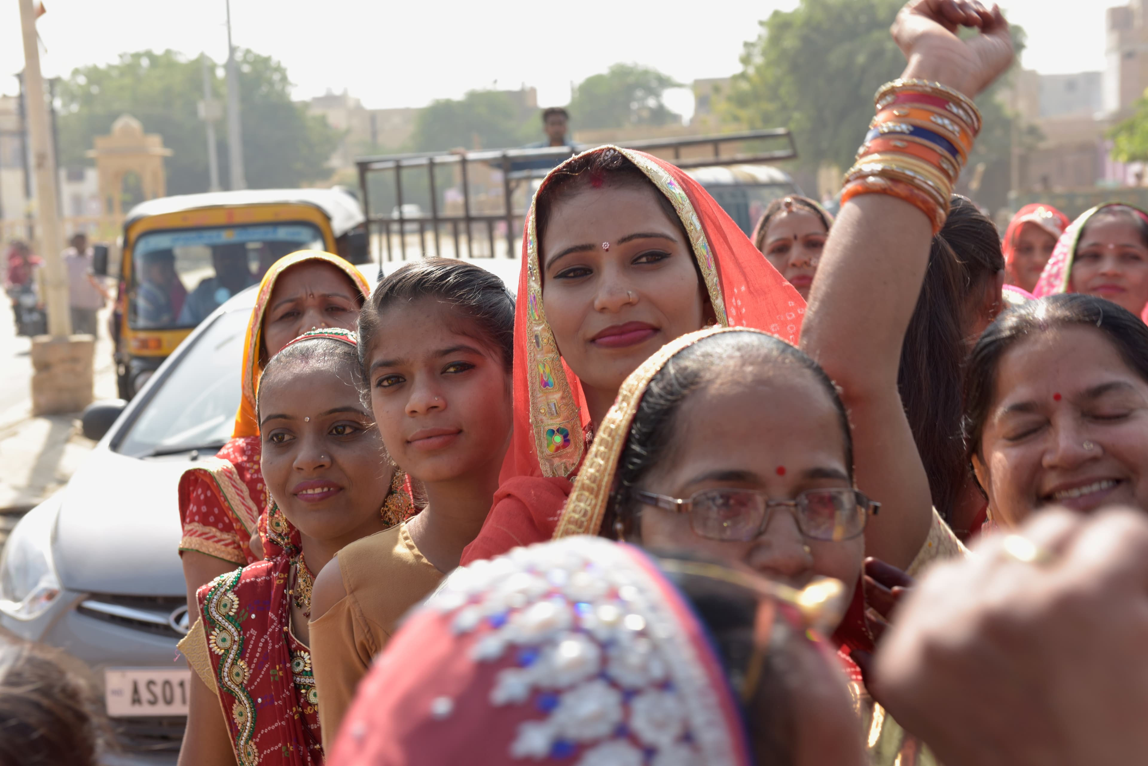 Women and girls gathered in the street during the wedding procession.